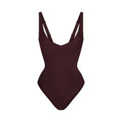 SKIMS BODY UNLINED PLUNGE THONG BODYSUIT | CURRANT