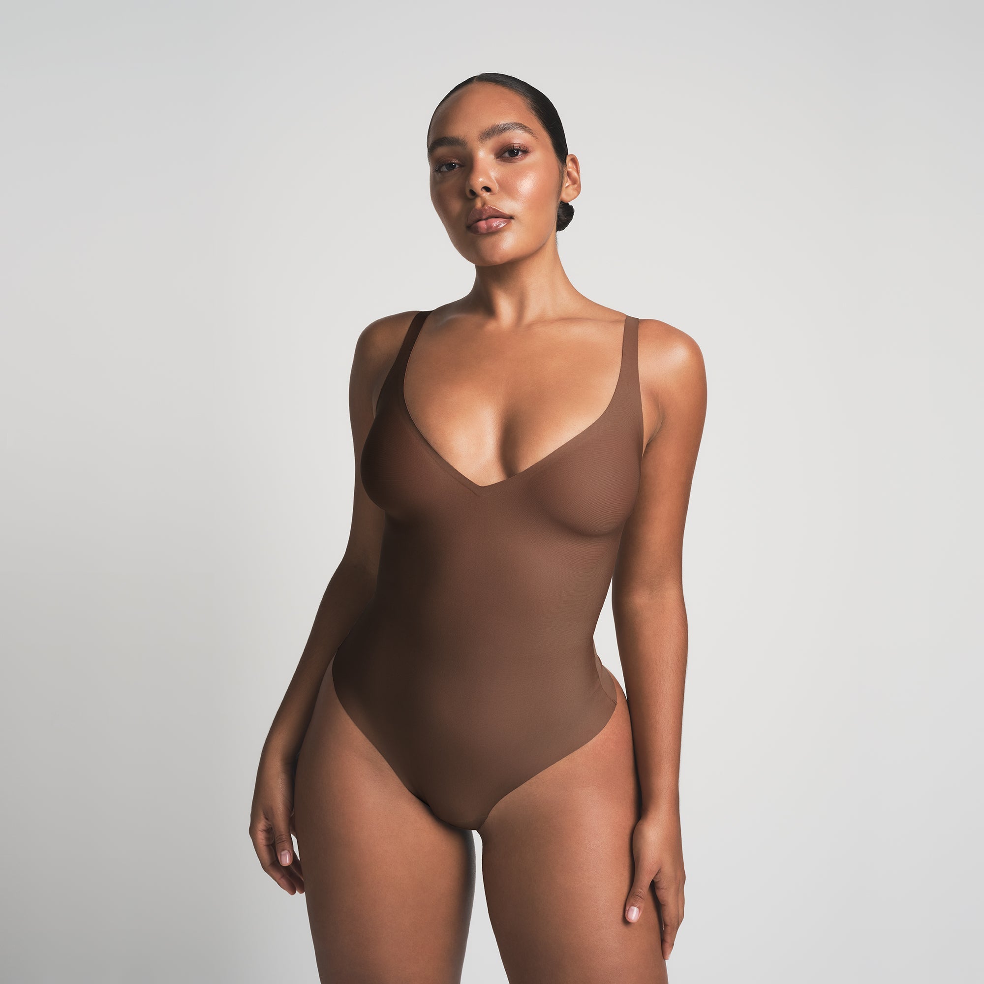 SKIMS BODY UNLINED PLUNGE THONG BODYSUIT | JASPER