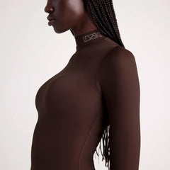 LUDOVIC DE SAINT SERNIN X SKIMS MILKY SHEER MOCK NECK LONG SLEEVE TOP | COCOA