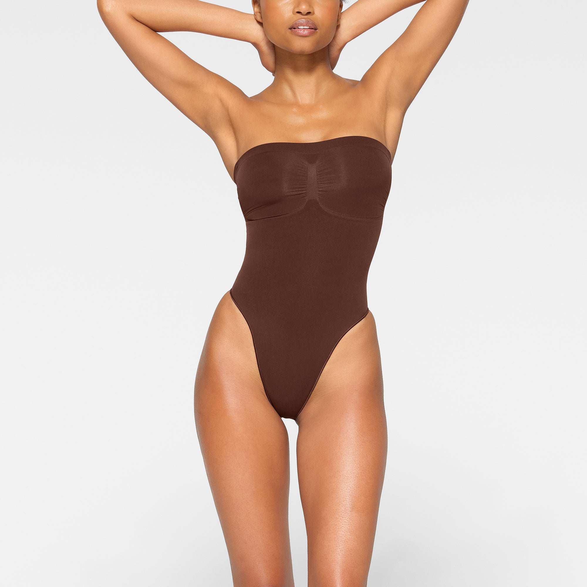 SEAMLESS SCULPT STRAPLESS THONG BODYSUIT | COCOA